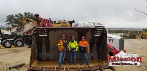 Mission Heavy Towing San-Antonio Team Posing in front of Front Loader