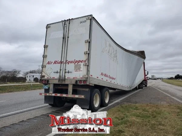 mission wrecker service collapsed trailer from weight of pallets prior to needing schertz wrecker service