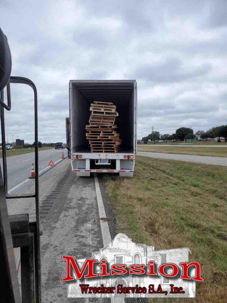 mission wrecker service trailer of pallets neari i10 prior to unloading